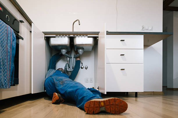 Professional Drain Cleaning technician working in Laurens, IA